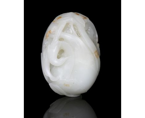 PROPERTIES FROM A NOTED COLLECTION OF JADES AND SNUFFBOTTLES  A WHITE JADE CARVING OF A LOTUS ROOT AND BIRD CHINA, QING DYNAS