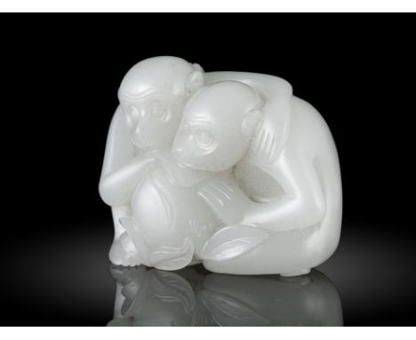 A WHITE JADE CARVING OF TWO MONKEYS WITH A PEACH CHINA, POSSIBLY QING DYNASTY OR LATER Carved out of a single piece of stone 