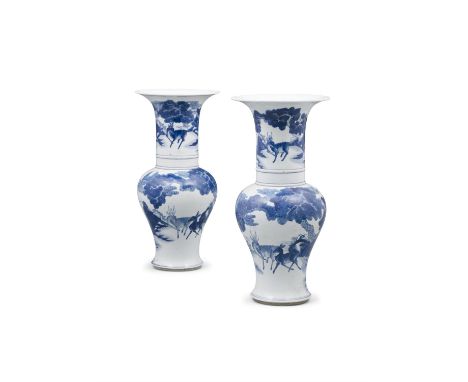 A PAIR OF BLUE AND WHITE PORCELAIN ‘STAG AND DEER’ PHOENIX-TAIL VASES, FENGWEIZUN CHINA, LATE QING DYNASTY TO REPUBLIC / MING