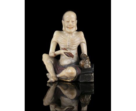 PROPERTIES FROM A NOTED COLLECTION OF JADES AND SNUFFBOTTLES  *A FINE SOAPSTONE ‘TIGER TAMING LUOHAN’ aka PINDOLA 賓頭盧 CHINA, 