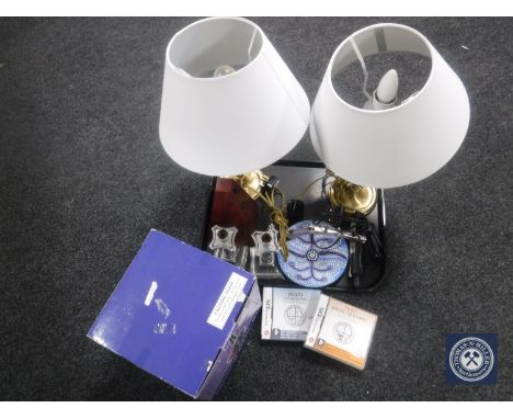 A tray of piano light, metronome, pair of plated candlesticks, pair of brass table lamps with shades, together with two Ninte