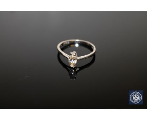 An 18ct white gold diamond solitaire ring, a marquise-cut diamond within a claw setting weighing approximately 0.41 carat, to