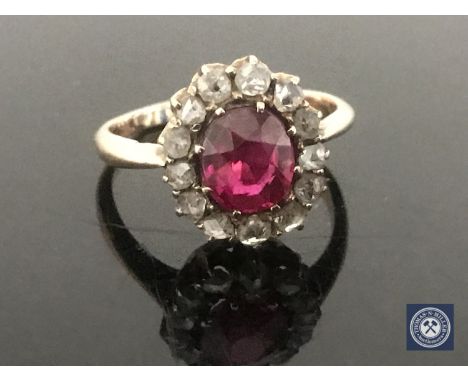 A late Victorian ruby and old-cut diamond cluster ring, size M CONDITION REPORT: Ruby of uncertain origin and is possibly syn