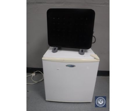 A Coolzone bench top fridge and an electric heater 