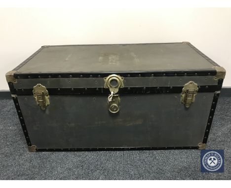 A 20th century metal bound travelling trunk 