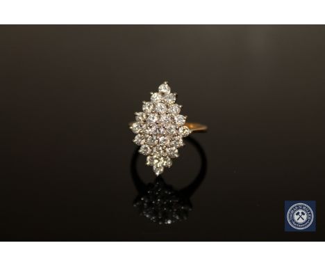 An 18ct gold diamond cluster ring, size M