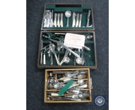 A 20th century oak canteen containing Sheffield Valiant stainless steel cutlery together with a tray of antique and later pla