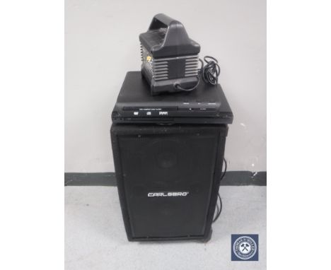 A Carlsbro Wanderer Deluxe portable music centre together with two DVD players and a Power Caddy charger