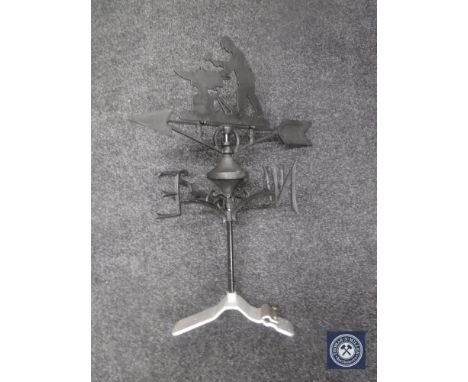 A cast metal Blacksmith weather vane 