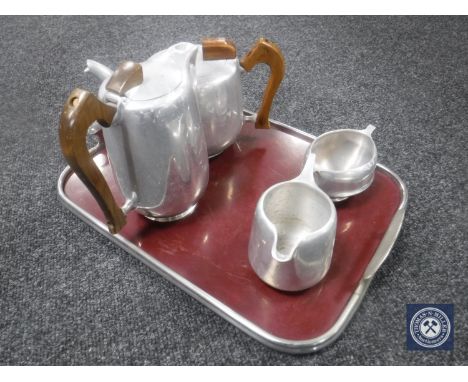 A four-piece Picquot ware tea service on tray