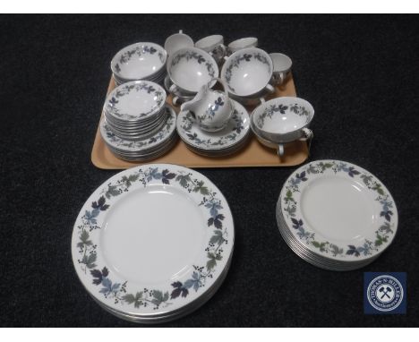 A sixty-piece Royal Doulton Burgundy tea and dinner service 