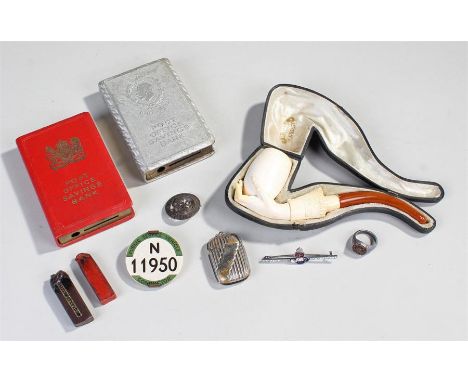 Cased meerschaum pipe, in the form of a hand holding a bowl, together with saving books, vesta, etc, (qty)