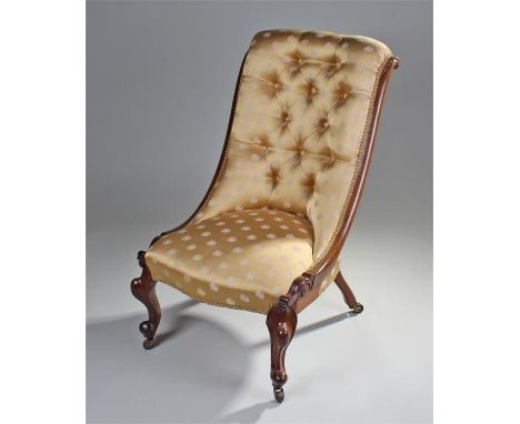 Victorian mahogany button back nursing chair, the stuff over back and seat, with show wood frame and cabriole legs