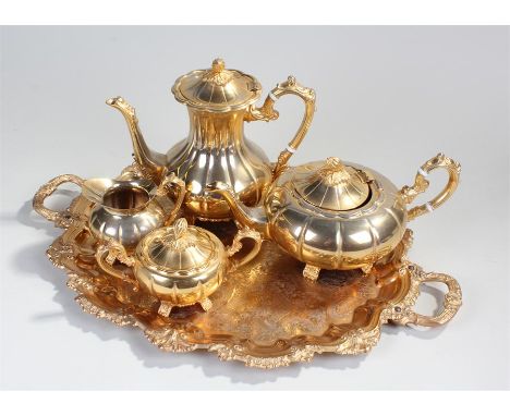 Modern gold plated teaset, comprising of a teapot, coffee pot, sugar bowl, cream jug and tray (5)