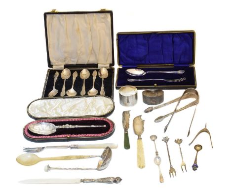 A selection of silver flatware, to include cased presentation spoon, cased teaspoons, silver tongs, napkin rings, etc, gross 