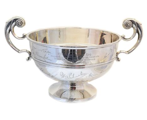 An Elizabeth II silver twin handled cup, of typical form, with inscription and signatures throughout, Walker &amp; Hall, Shef