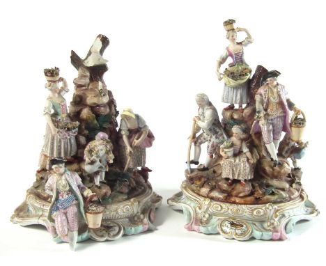 Two large Dresden figure groups, modelled representing gardeners, Meissen crossed swords marks to bases, late 19th century.32