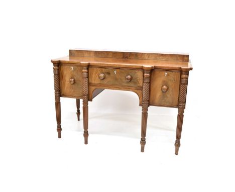 William IV mahogany sideboard, top with raised box display shelf, lower section with cupboard and cellarette flanking central