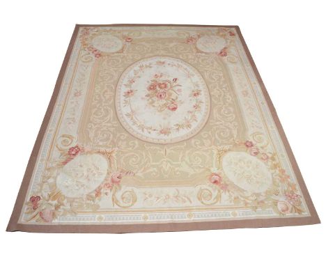 Early 20th century French Aubusson tapestry rug, classical design, oval centre panel with roses, pastel green field covered w