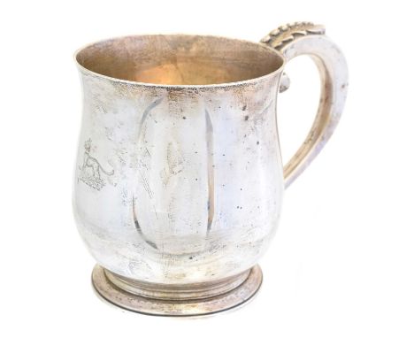 A Victorian silver baluster mug, with crest engraving and acanthus leaf scrolling handle, hallmarks for F C Richards, Birming