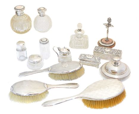 A selection of silver, to include a hat pin stand, silver lidded jars, silver backed brushes, etc. (q).