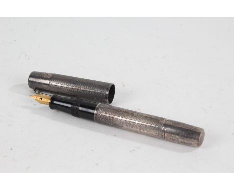 Waterman's 'Ideal' silver cased fountain pen, with engine turned case
