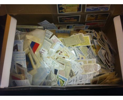 Shoe box of cigarette cards loose and in books, (100's) 