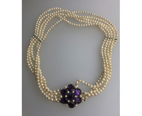 A five-row cultured pearl choker necklace, the uniform round pearls threaded onto 9ct yellow gold large amethyst and pearl se