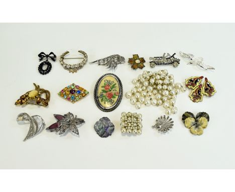 A Varied Collection Of Vintage Brooches Seventeen items in total to include crescent shaped crystal set brooch, black and cle