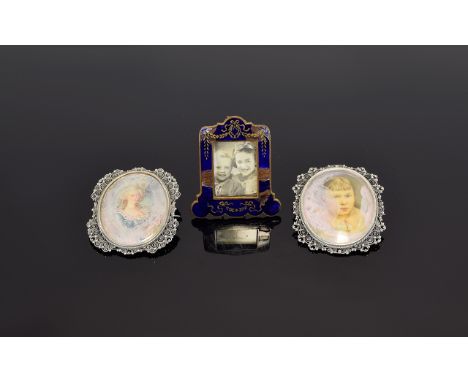 A Fine Pair of Ornate Silver Framed Portrait Pendant Brooches. Marked 800 Silver. Each 2 Inches High + An Antique Miniature E