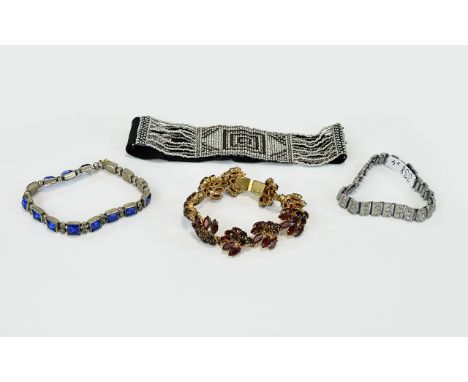 A Small Collection Of Vintage Costume Jewellery Bracelets Four items in total to include 1930's cut steel seed bead armband w