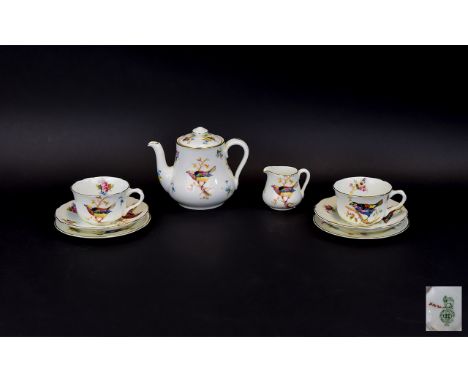 Royal Doulton Tea For Two Set Eight pieces in total, pattern number H1422 comprising teapot, two cups and saucers and milk ju