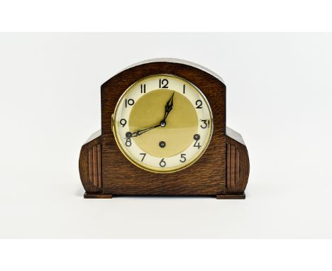 Art Deco Mantel Clock, Vintage wood cased clock in typical 1930's style. Features brushed gold face with white border and gol