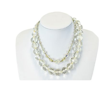 A Pair Of Vintage Faceted Crystal Necklaces Two in total, the first comprising clear circular faceted glass graduated beads. 