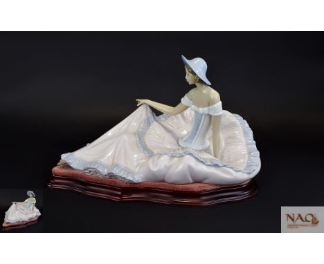 Nao by Lladro Prestige and Rare Large Figure ' Grace ' Model No 1265. Lady In Ball Gown Seated - Retired, Raised on a Shaped 