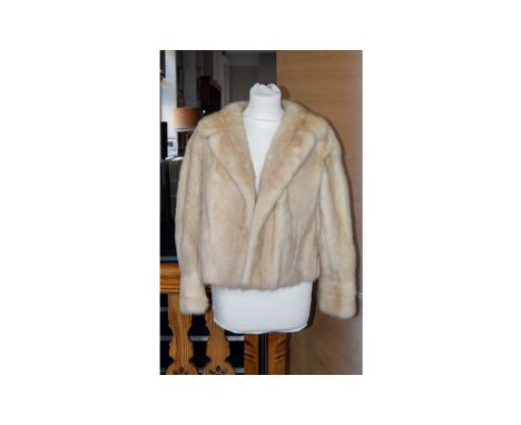 Blonde Mink Short Jacket Ladies vintage bolero style jacket in plush blonde mink. Features shawl style collar, hook and eye c