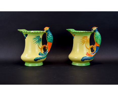 Two Burleigh Ware Vintage 1930's Parrot Jugs Whimsical pale primrose yellow jugs with hand painted butterfly motif, black das