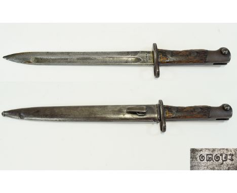 Anglo Indian WWI Bayonet With Steel Scabbard (please see photo for marks on hilt and blade). 15.5 inches in length.