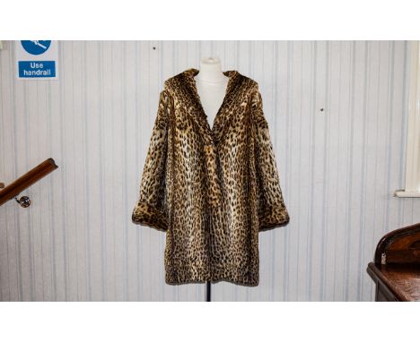 Ocelot Coat Ladies vintage ocelot three quarter coat with impressive shawl collar, side seam pockets, hook and eye closure an
