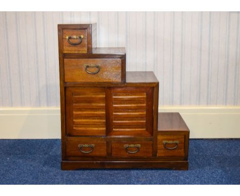 Japanese Step Tansu Hardwood Tansu Containing Four Sliding Doors And Five Drawers. Height 31 Inches, 27 x 16 Inches deep
