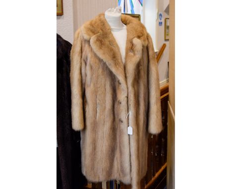 Golden Blonde Mink Coat Three quarter vintage coat in plush blonde mink with side seam pockets and revere collar. hook and ey
