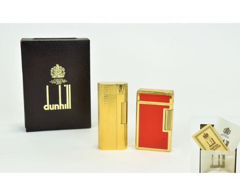 Dunhill Good Quality Gold Plated Lighter from the 19780's. 20 microns plated 94168. Comes with box and papers. In as new cond