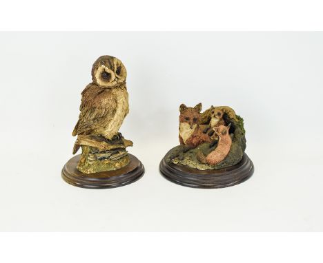 Country Artists Resin Wildlife Figures  Two in total on circular wooden bases, the first depicting a vixen and three cubs at 