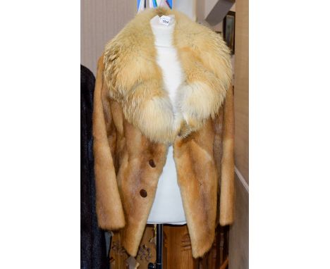 Vintage Fox Fur Jacket Hip length ladies jacket with statement fox fur shawl collar, side seam pockets and button covered hoo