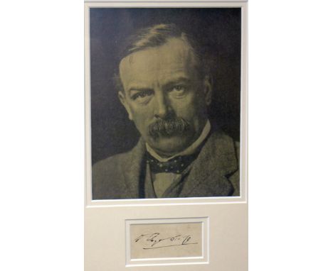 DAVID LLOYD GEORGE autograph and photograph - sepia portrait framed jointly with a hand signature on House of Commons embosse