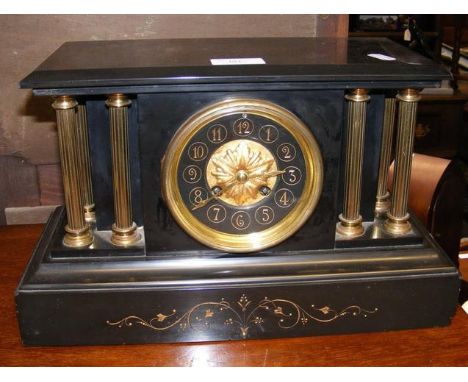 A Victorian slate mantel clock with striking movement 