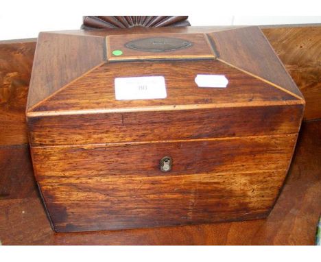 A Victorian casket shaped tea caddy 