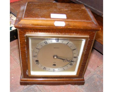 A chiming mantel clock by Elliott - retailed by Kemp & Wilcox, Wolverhampton - 24cm high CONDITION REPORTmovement attached
