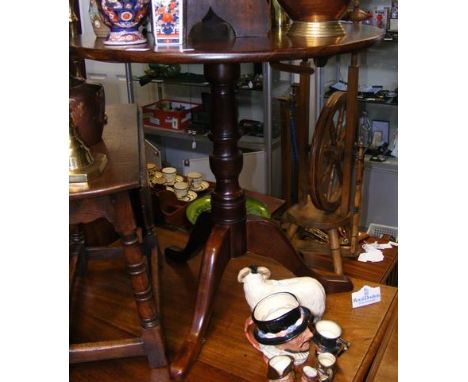 Antique circular tripod table 