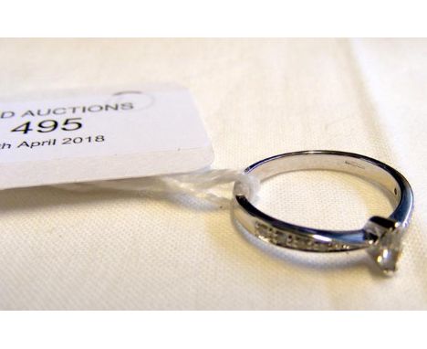 An 18ct white gold marquise set diamond ring - .25ct total - Size M 